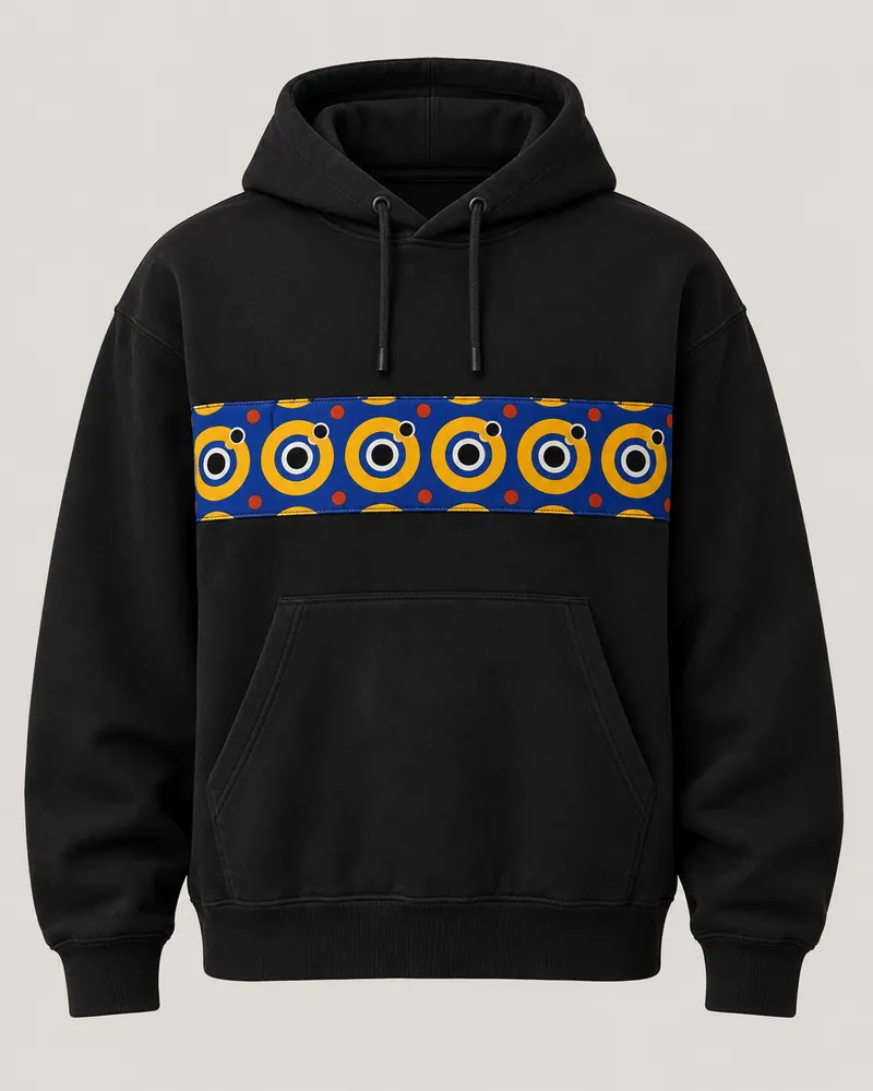 Solid black hoodie with a sewn wax chest panel, front view. AI-generated product concept.