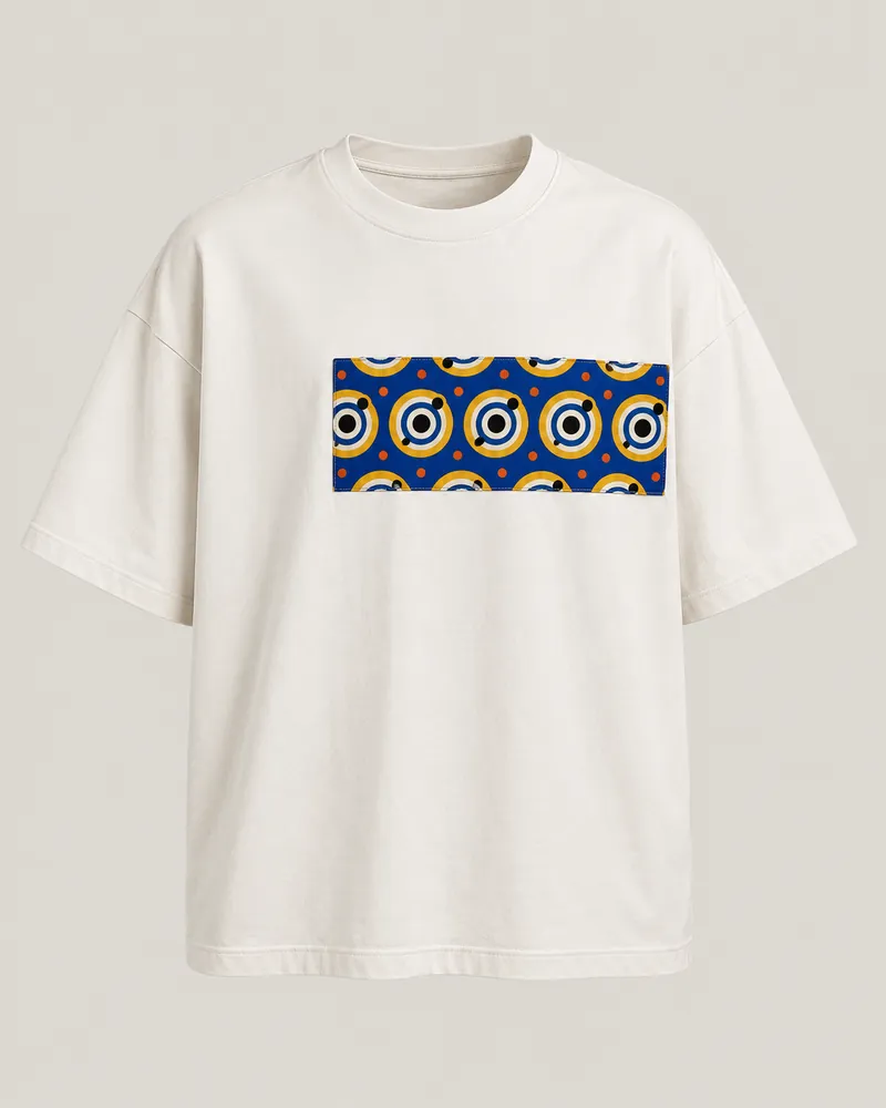 Solid off-white boxy T-shirt with a sewn wax chest panel, front view. AI-generated product concept.